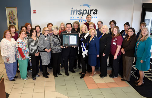 Inspira team pictured with AMSN CEO receiving Academy of Medical-Surgical Nurses’ PRISM Award