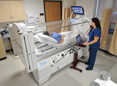 Patient receiving hyperbaric oxygen therapy