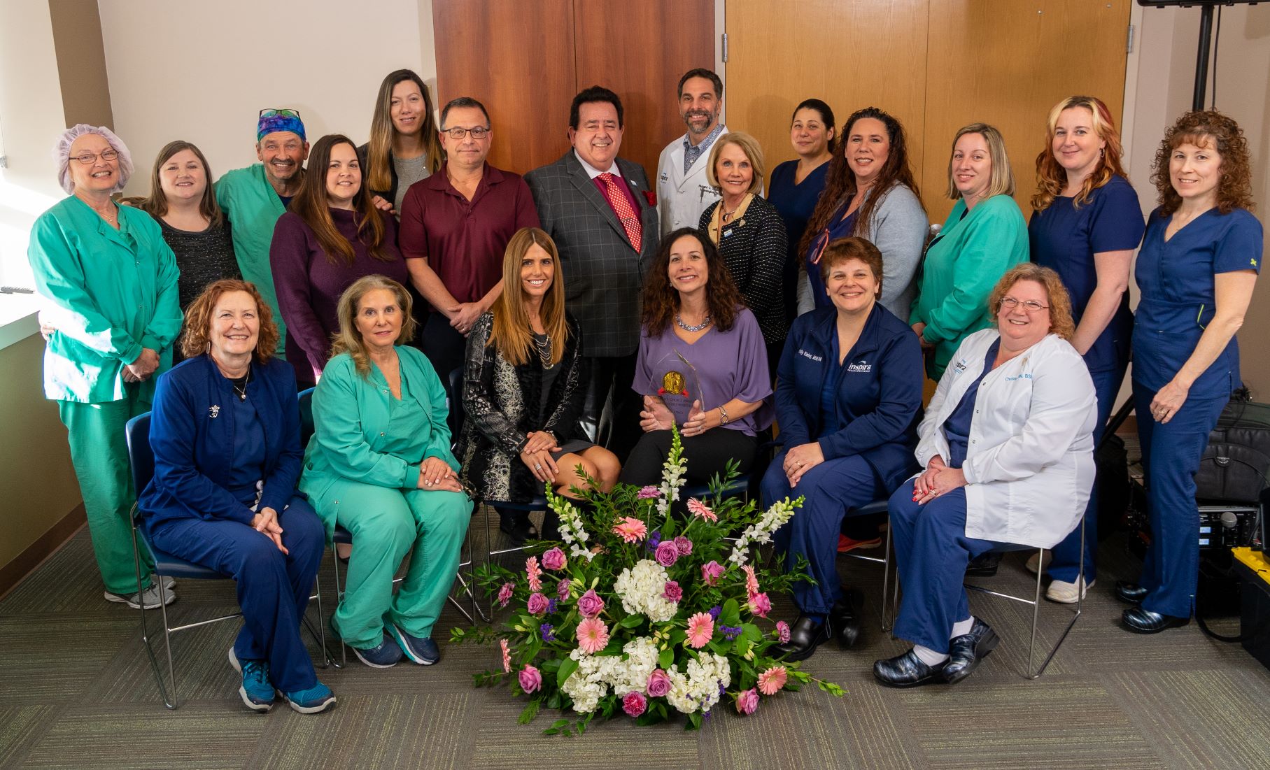 Inspira Employes receiving the Womens Choice Award for One of America’s Best Hospitals for Obstetrics and Orthopedics
