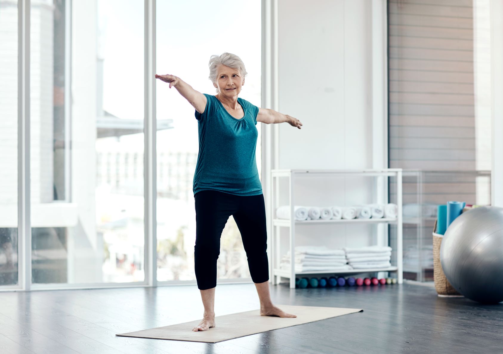 senior woman yoga balance pose
