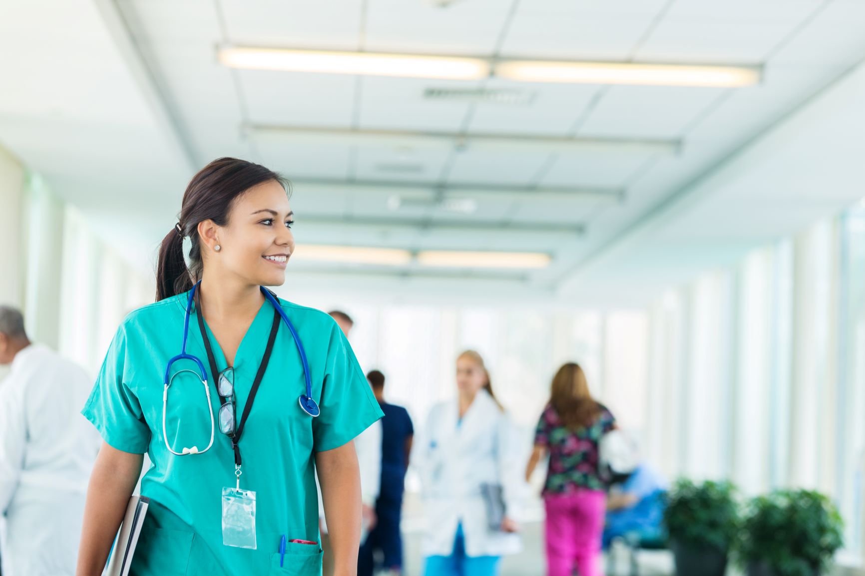 medical student walking down a hallway