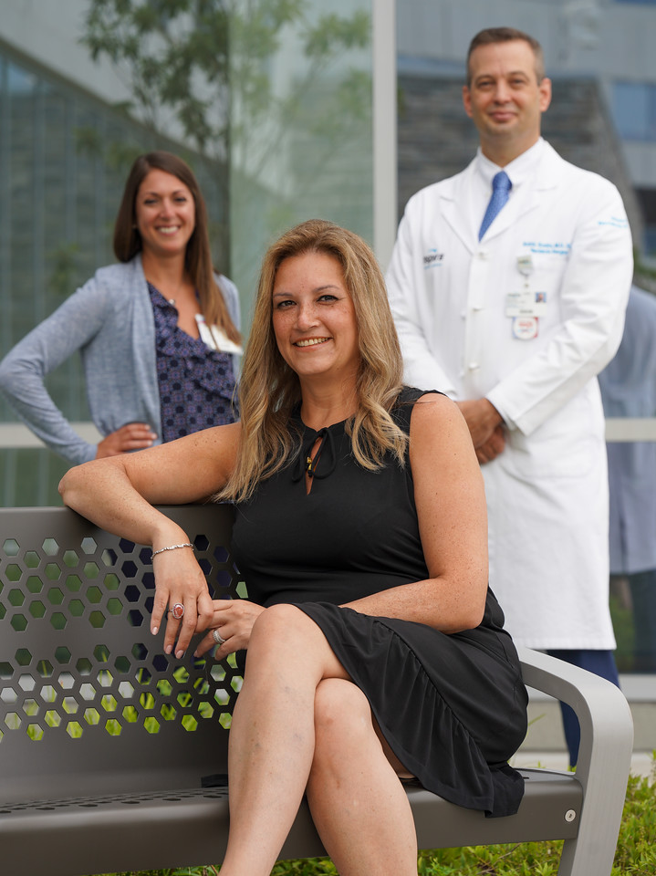 Patient Anna Ferker, poses with Nutritionaist Bradee Rojas, and Bariatric Surgeon Keith Kreitz, MD, at Inspira Medical Center Mullica Hill Outpatient Center where the bariatric team lead her weight loss journey.