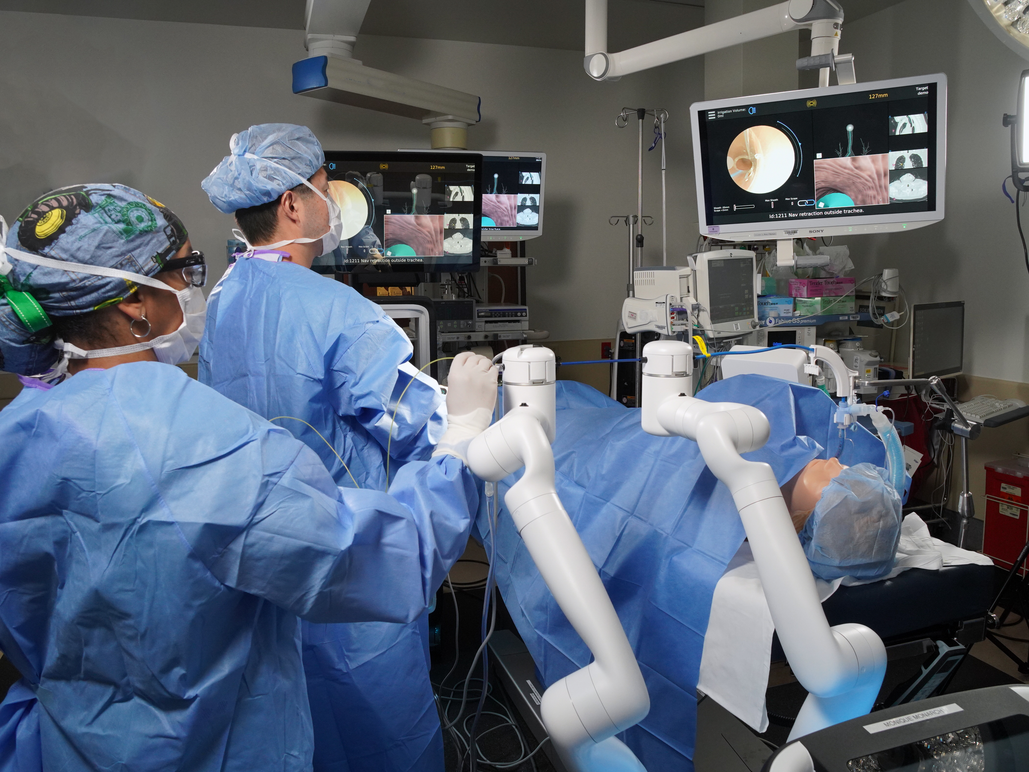 Surgeons using the latest medical technology 