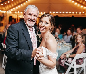 Chuck Pellegrini dancing with his youngest daughter, Melissa.