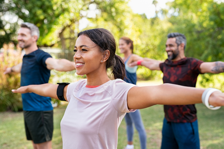 Women in group exercise in the park