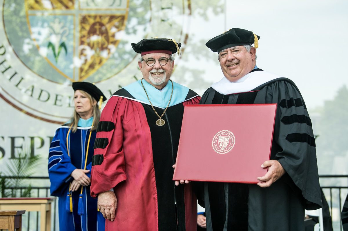 Joseph A. DiAngelo, Ed.D., dean of the Haub School of Business at Saint Joseph’s University, celebrates the conferring of an honorary Doctor of Humane Letters degree received by his brother, John A. DiAngelo, retired former president and CEO of Inspira Health.