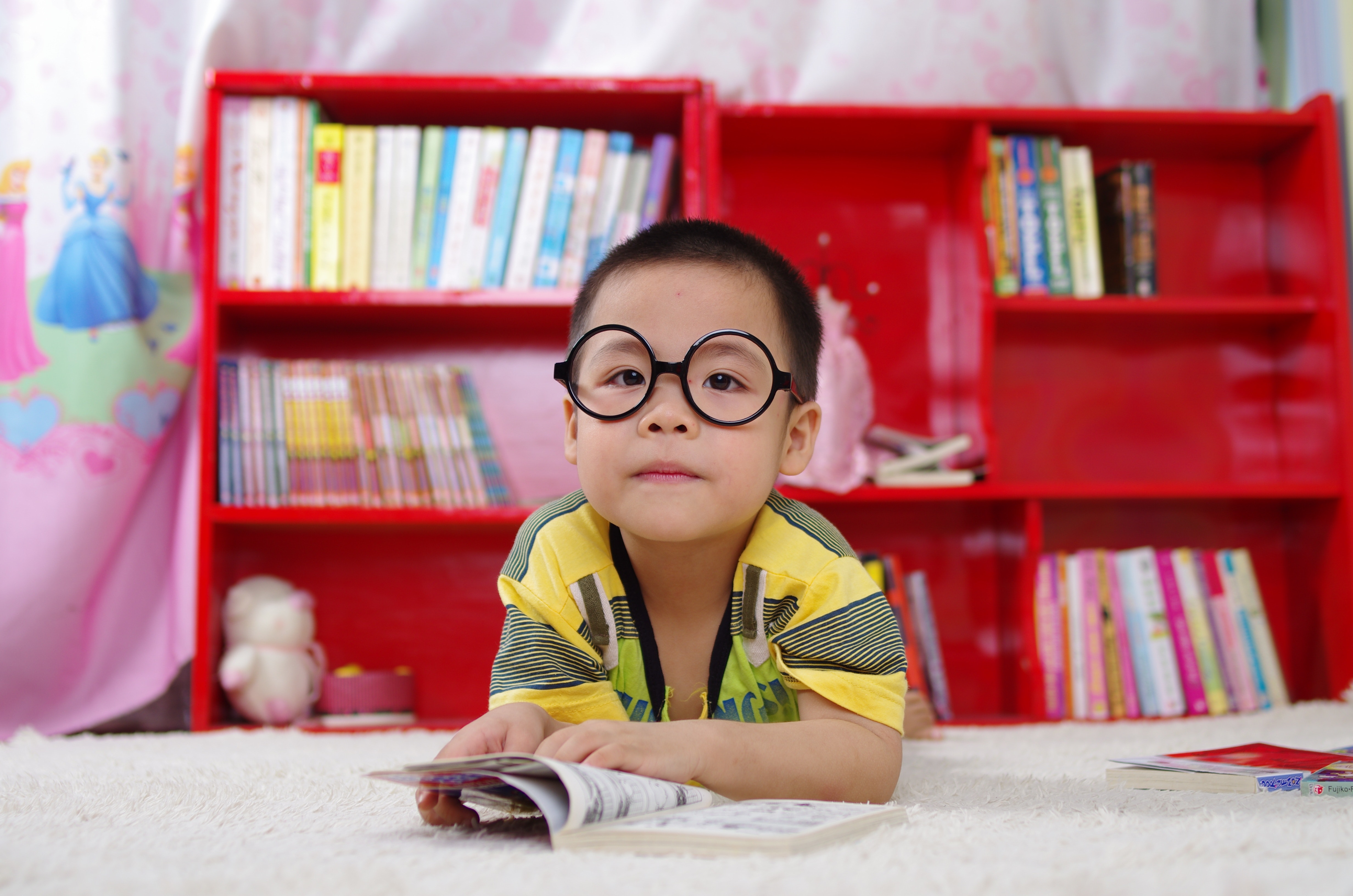 child taking a break from reading