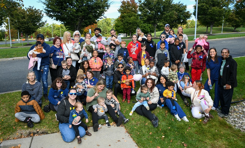 NICU families were joined by members of the NICU care team for a group photo at the 10th anniversary celebration of the Deborah F. Sager Neonatal Intensive Care Unit at Inspira Medical Center Vineland