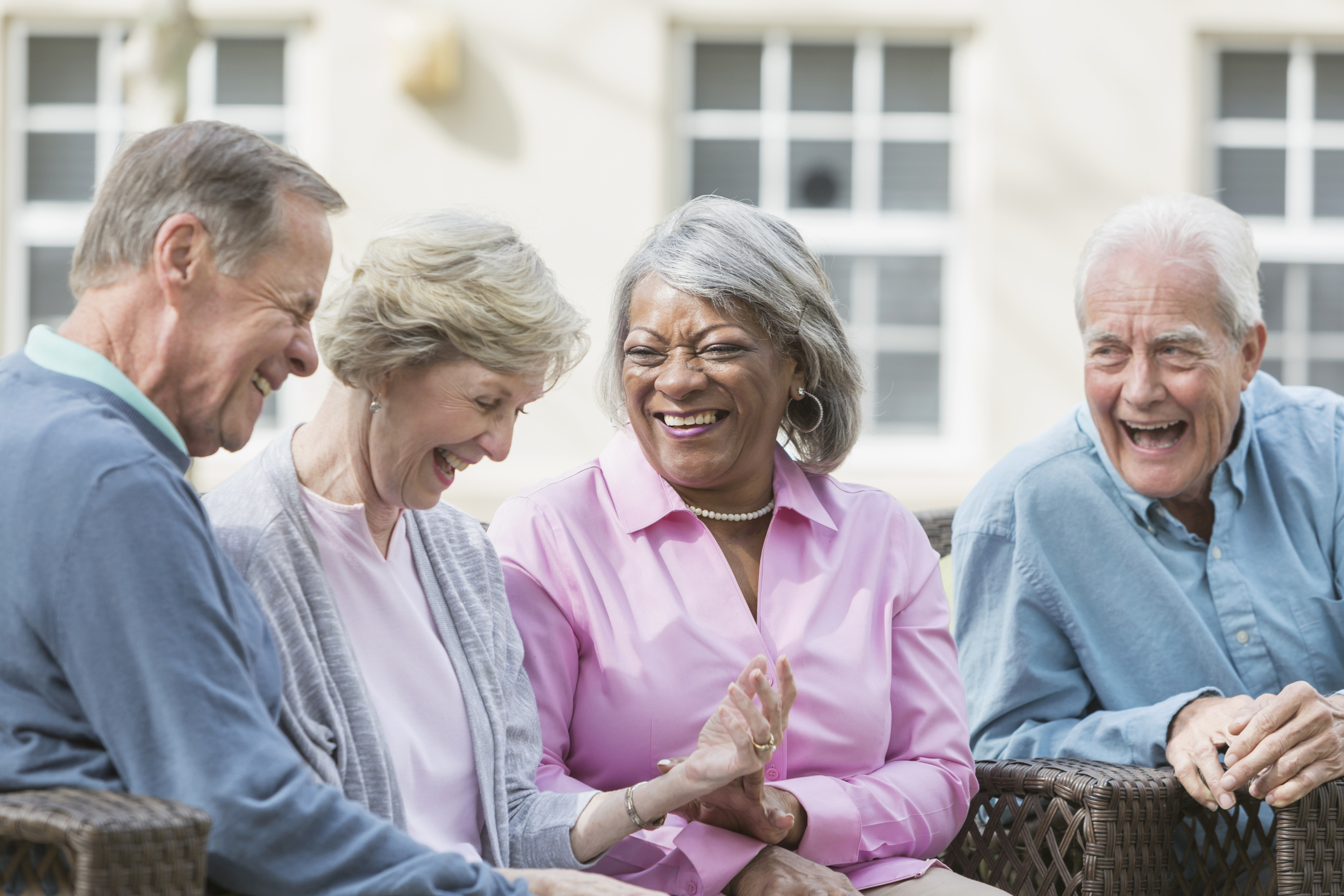 group of elderly friends socializing