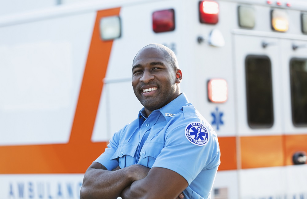 Paramedic Standing in Front of an Ambulance