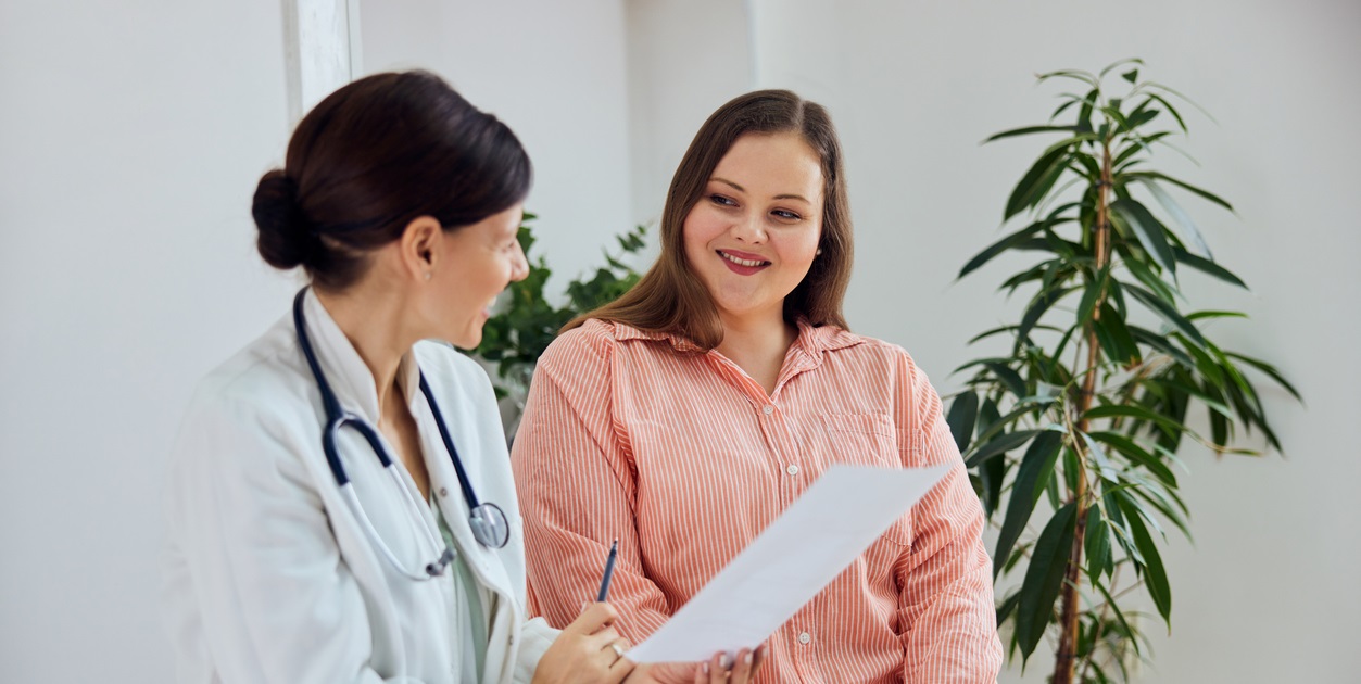 female patient discussing medical weight management with female doctor