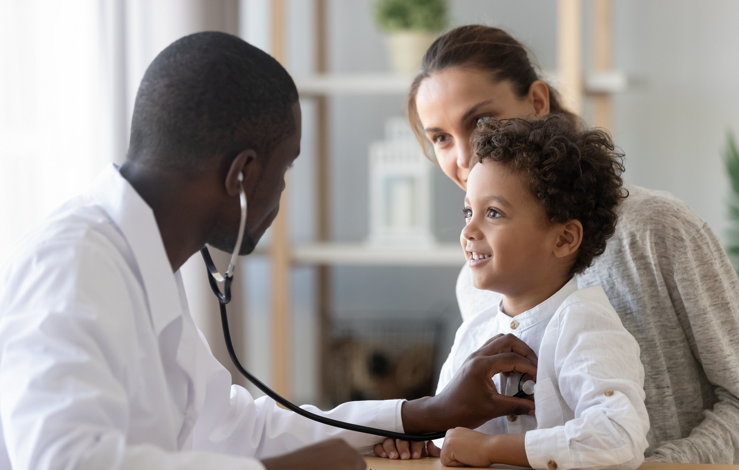 doctor checking a kid