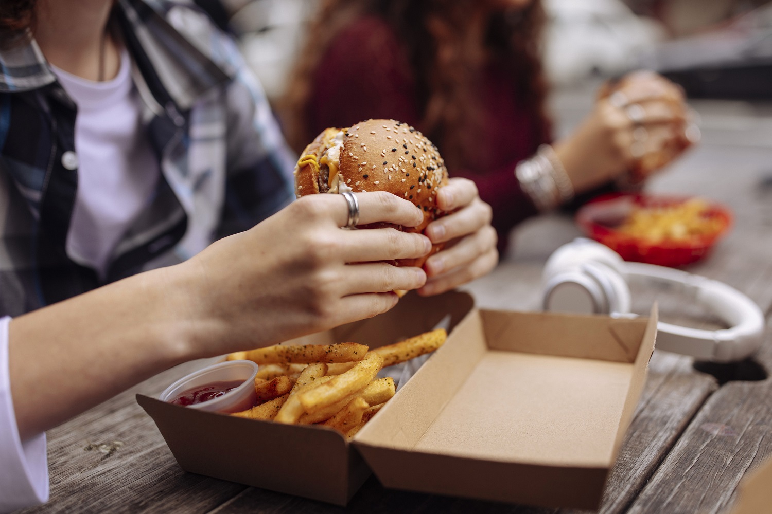 girl eating hamburger