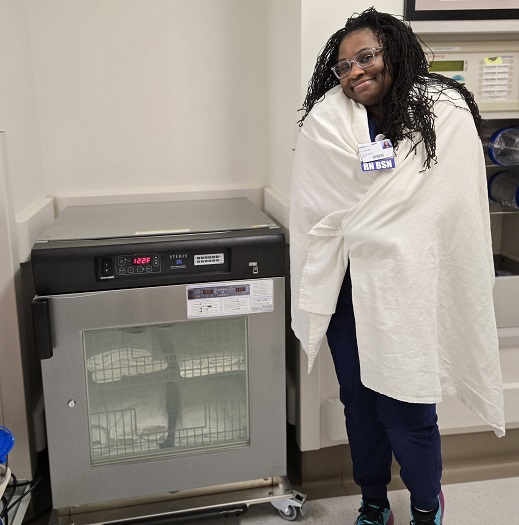 Patient wrapped in warmer