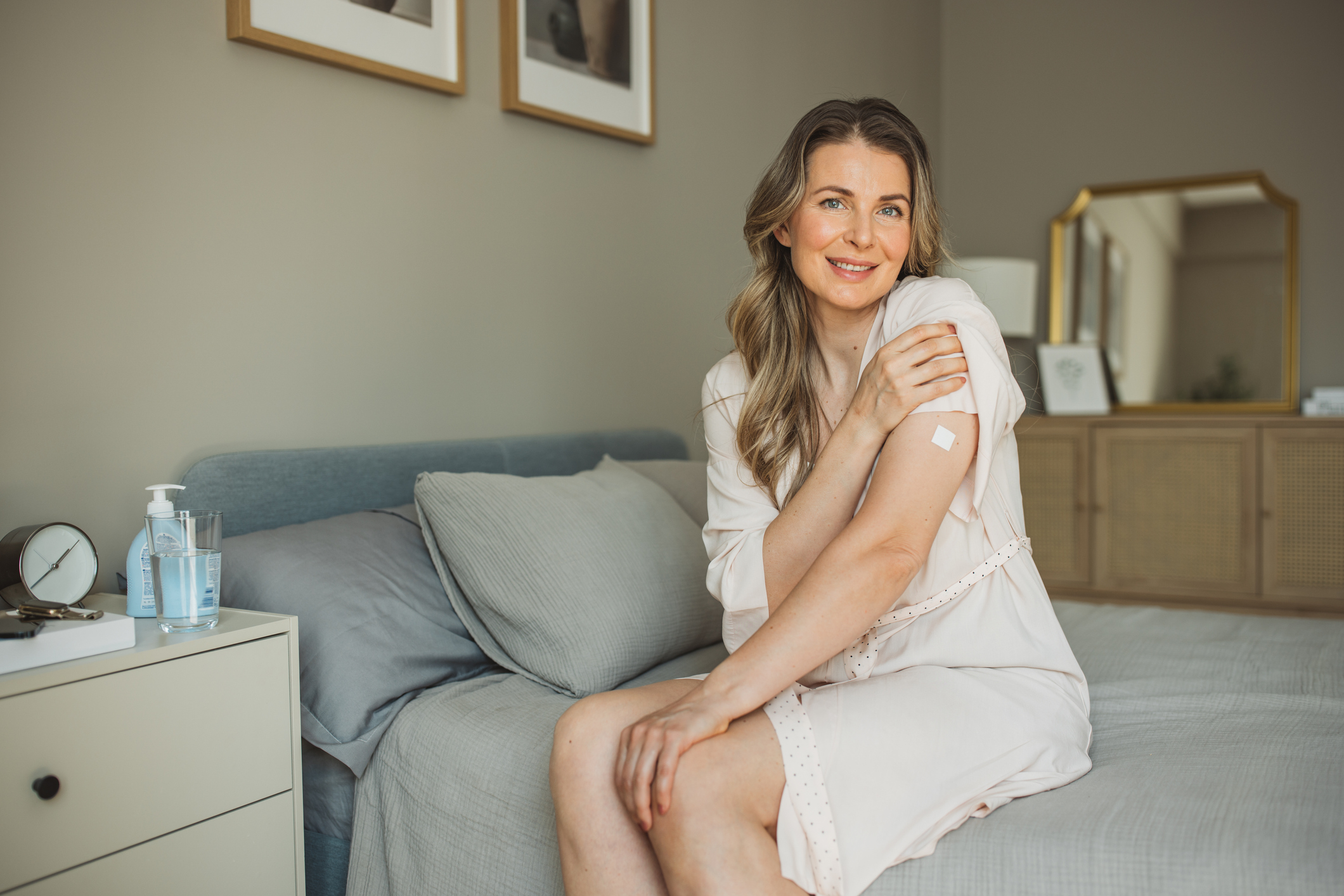 woman with patch on her left arm