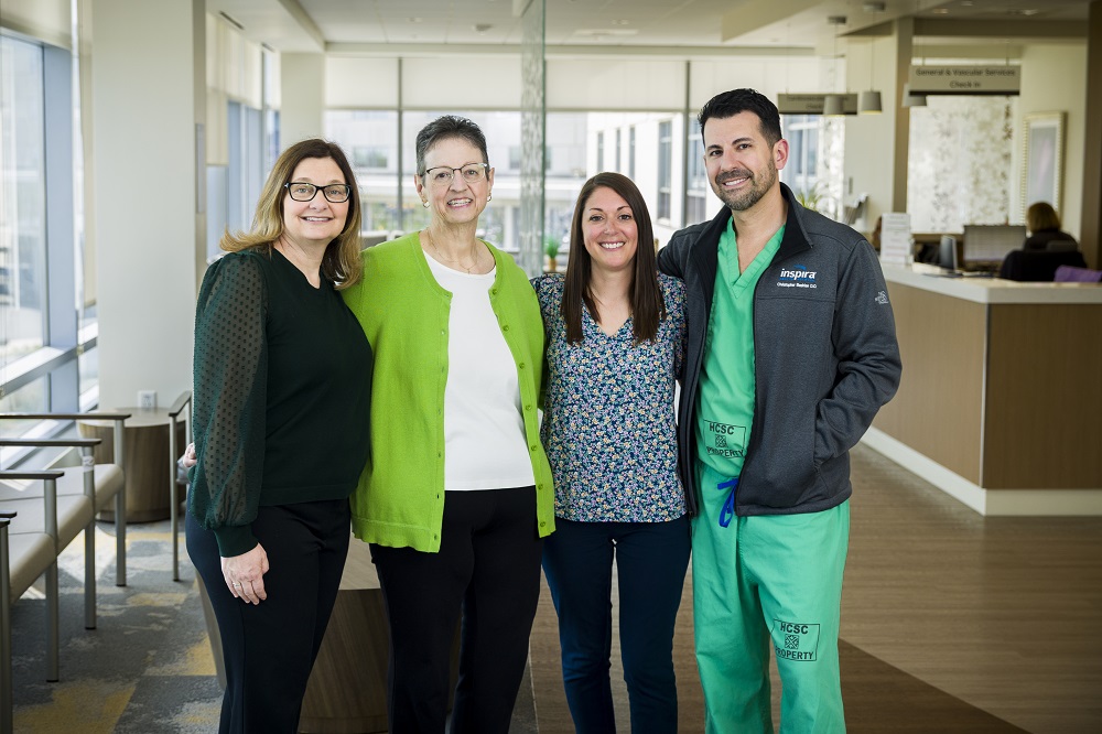Group picture of doctor, nurses and the patient 