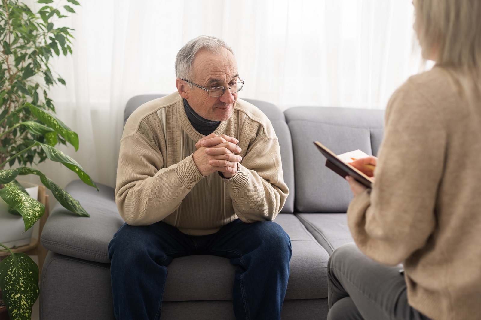 Senior man consulting health councelor