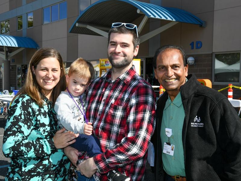 (Right) Neonatologist Horace Ramdial, M.D., reconnects with the Enders family. Little Joseph spent time in the NICU in early 2020