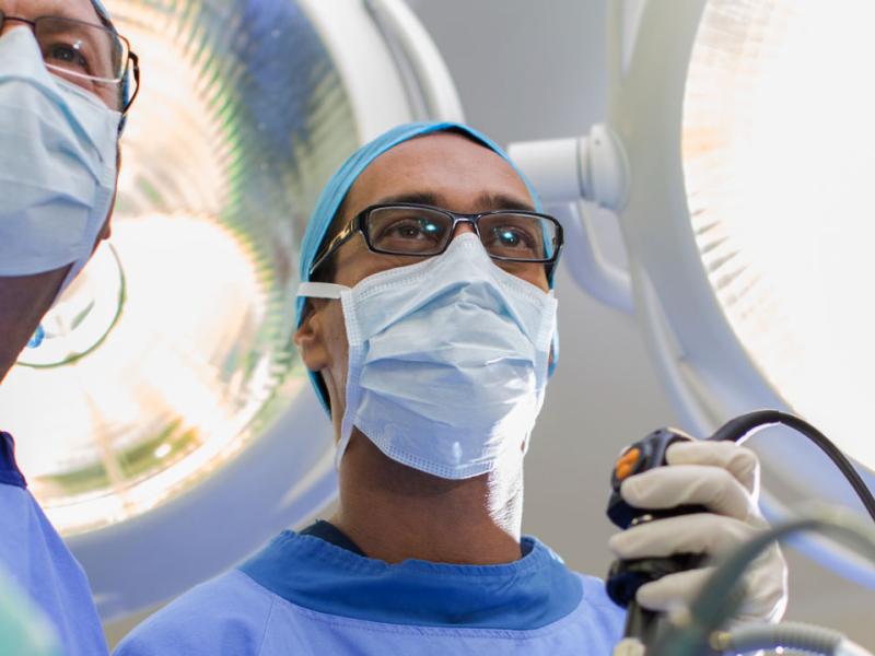 Two Male Doctors in Surgery Room