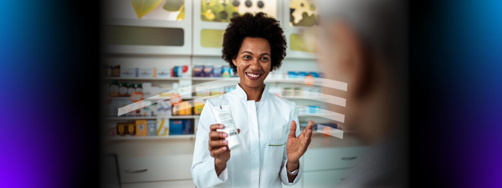 Female pharmacist giving patient prescription 