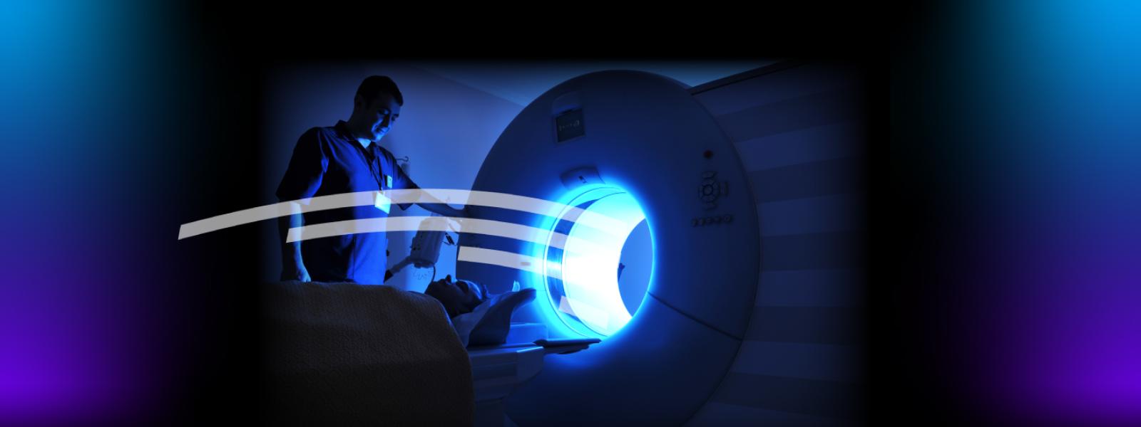 Tech operating MRI machine