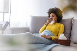 woman sitting on couch
