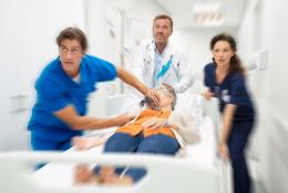 Medical staff rushing to hospital with patients