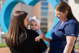 Rachel and her labor and delivery nurse and her baby