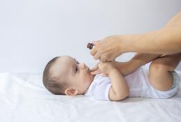 infant baby drinking medicine