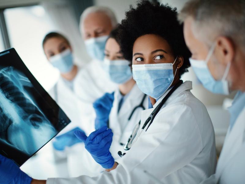Fellowship Program Medical Students Reviewing an X-ray 