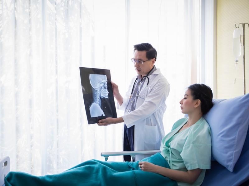 Orthopedic Doctor reviewing x-ray results with patient