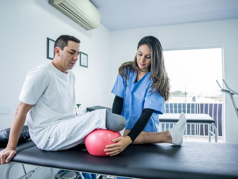 man with amputated leg doing physical therapy