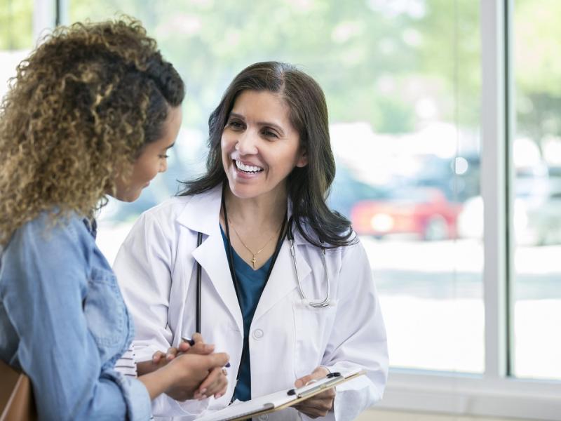 Female Doctor Discusses Something With Patient