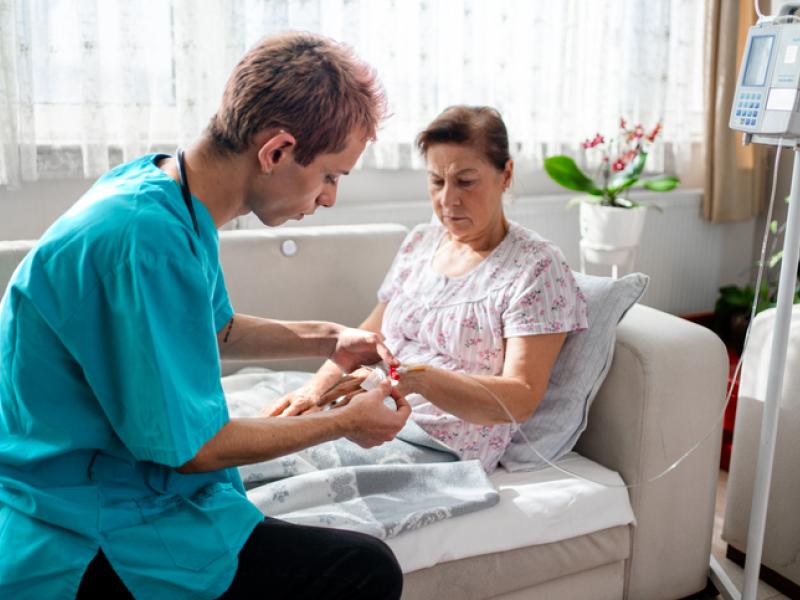 Doctor training patient for home dialysis