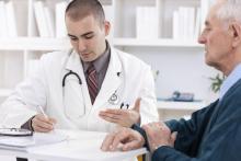 A doctor meeting with a patient