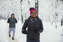 two people going for a run in the snow
