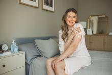 woman with patch on her left arm