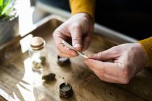 Man rolling cannabis