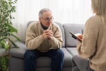 Senior man consulting health councelor