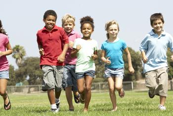 group of children running outside 