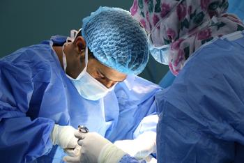 Two surgeons performing surgery