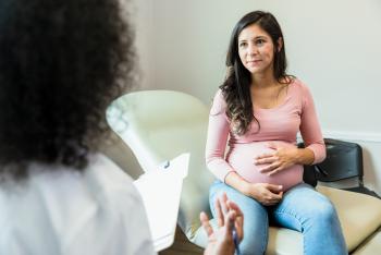 dr speaking with pregnant patient