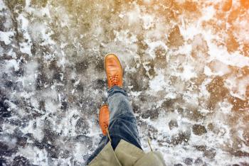 person walking on ice