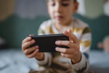 child using a smartphone