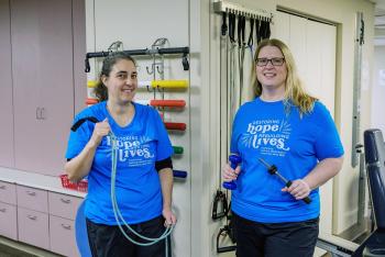 patient with physical therapist