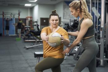 woman working out with her Physical Therapist